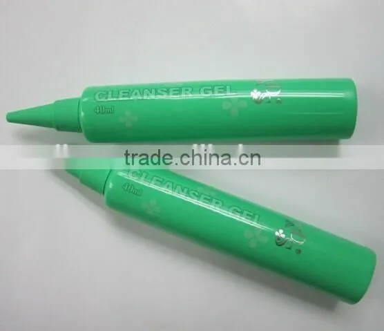Round Cosmetic Tube with Acutilingual Head and Nozzle Cap