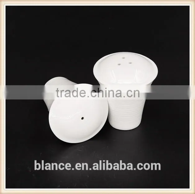 simple white ceramic salt and pepper shaker