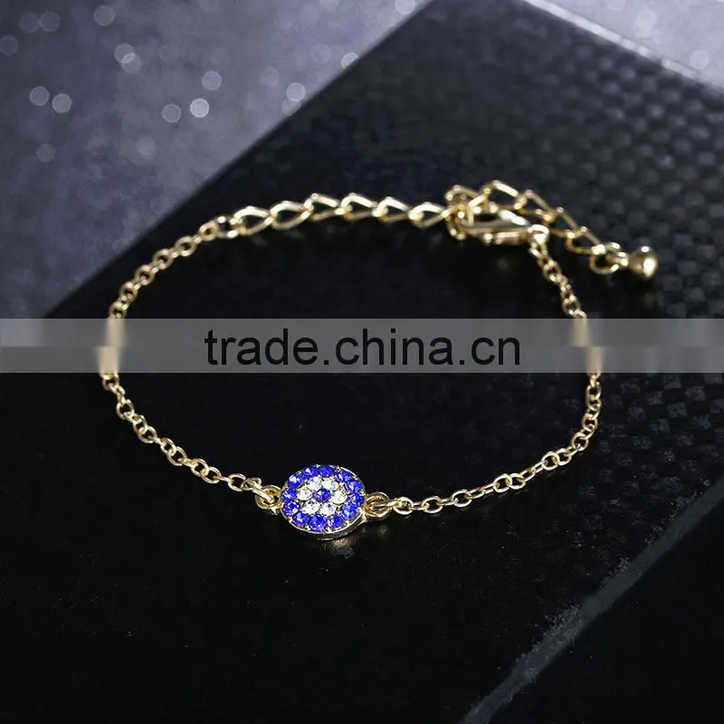 rhinestone evil eye charm gold chain bracelet