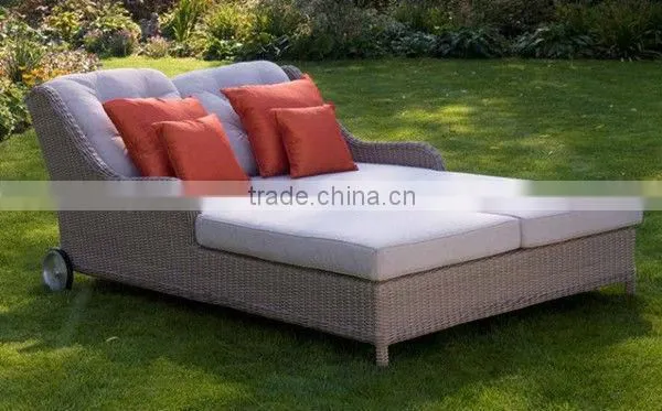 Gray Rattan Double Lounge With Wheels Cushion and Pillow