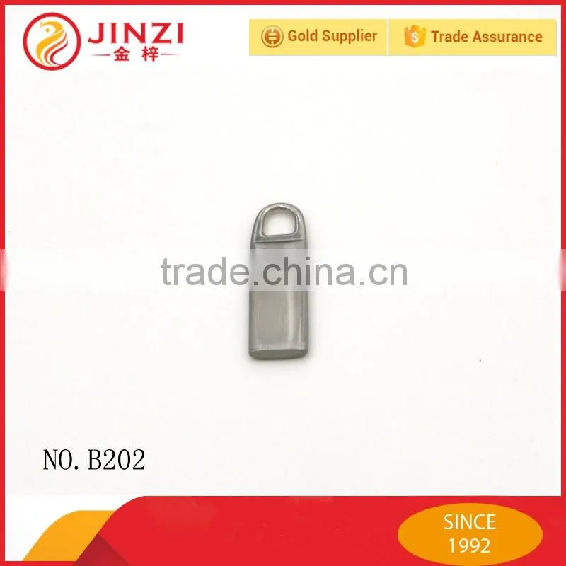 Metal zipper pull for handbags