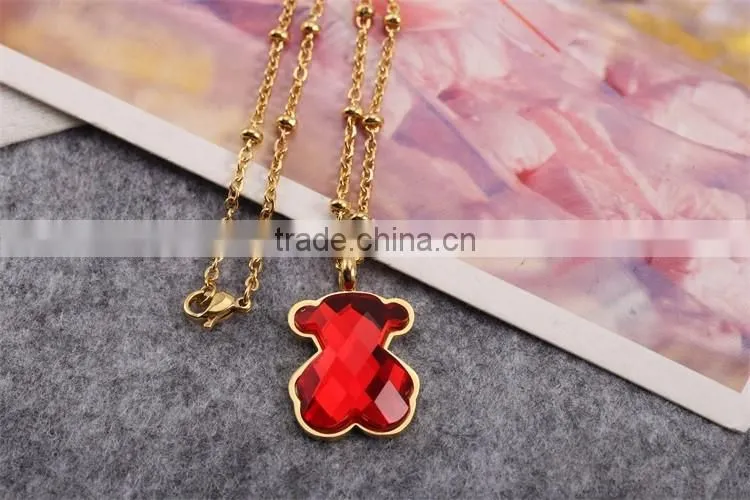 Guangzhou biggest wholesale fashionable gold long chain red crystal necklace with bear pendant
