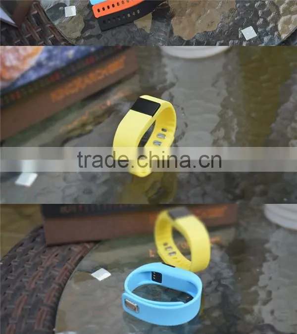 A button the TW64 smart bluetooth bracelet