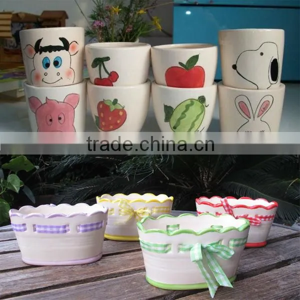 face design terracotta unglazed ceramic flower pot