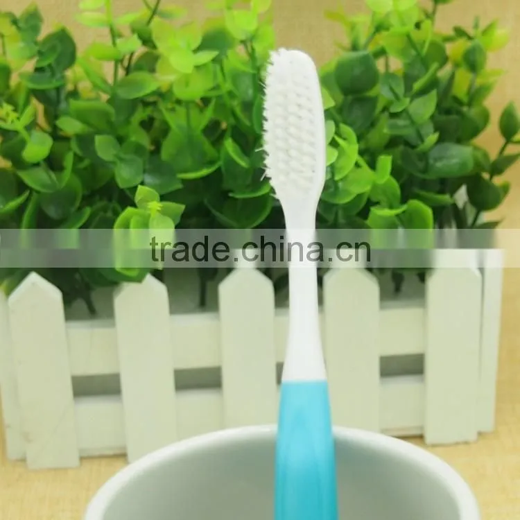 Dupont nylon rounded bristle Long rubber handle adult toothbrush