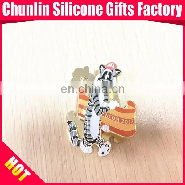 carved lapel pin with resin