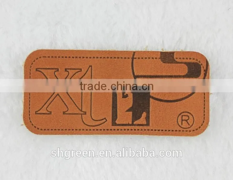 Green laser cut hot press embossed logo leather patch