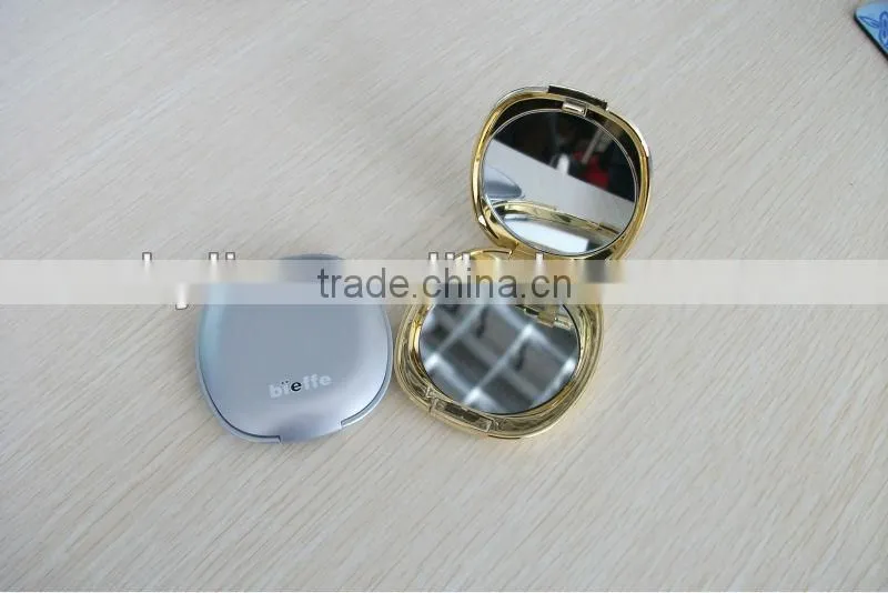 double side plastic cosmetic mirror .