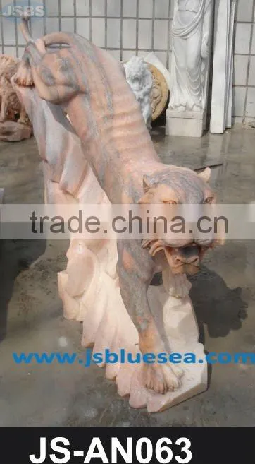 Black marble cow and cowherd statue