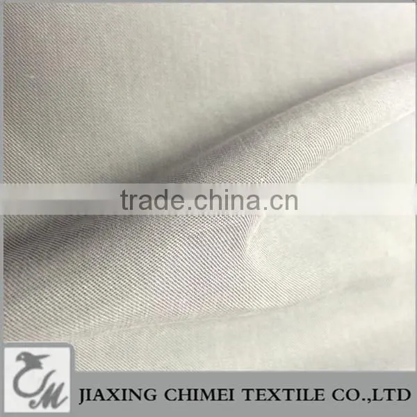 Jiaxing popular shirt fabric of 100% tencel plain fabric tencel lyocell woven