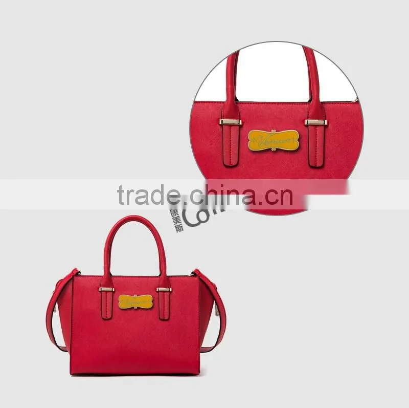 Different color filled custom fancy handbag metal logo