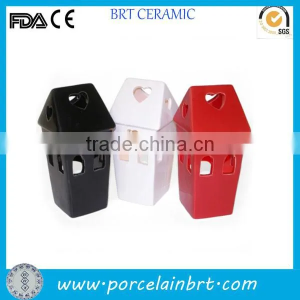 House shaped ceramic tea light holder