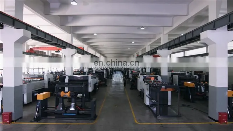 UCM1900A High Speed 4 Roll Automatic Paper cutting slitting Machine with conveyor belt stacker