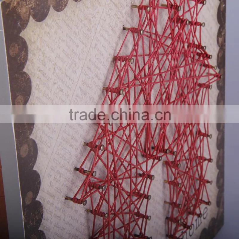 wooden string wall art with the house shaped design for back to school season