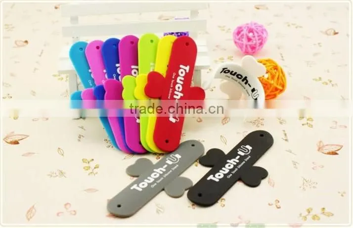 Universal silicone phone holder/touch-U phone stand
