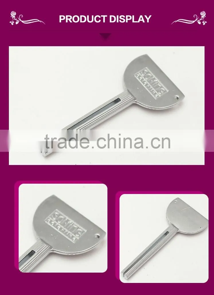 ZENGCHEN HAIRDRESSING(9 years factory)high quality silver metal Key tube squeezer toothpast squeezer