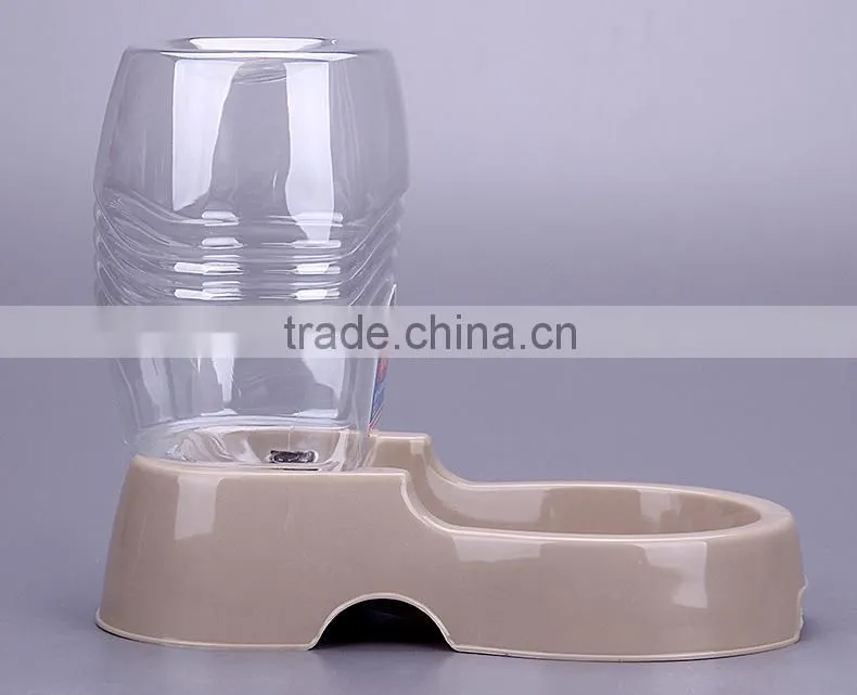 Pet dogs and cats sitting drinking fountain