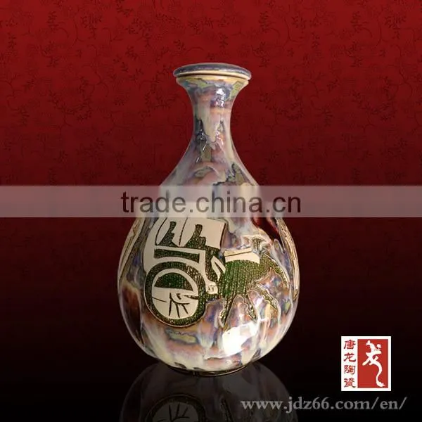 Chinese supplier blue and white ceramic wine and liquor bottle for wholesale