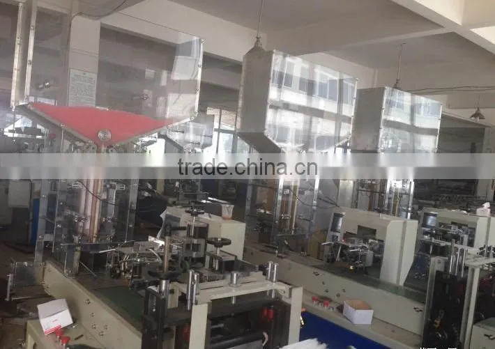 Napkin paper machine/cutting machine and packing machine