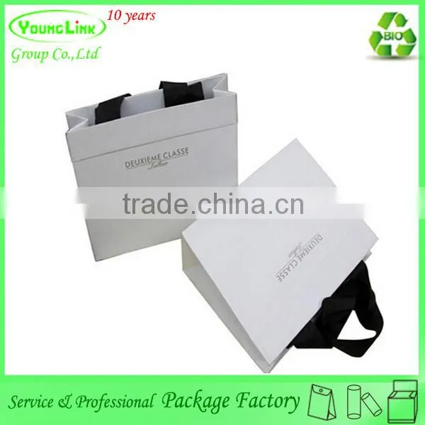 Printing paper shopping bag for clothes with ribbon