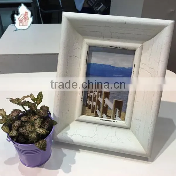 White color photo picture frame with smooth surface and crack painting frame