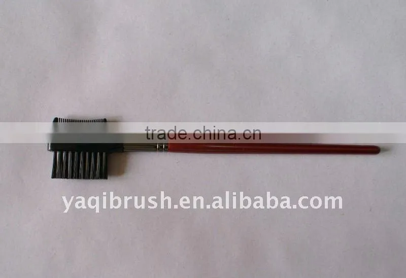 eyebrow comb and lash brush with red handle