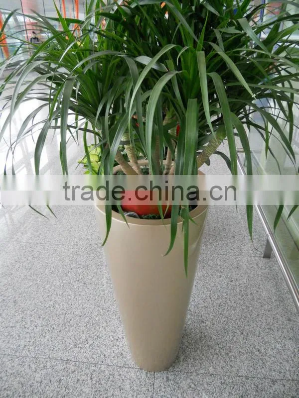 Gold fiberglass planter