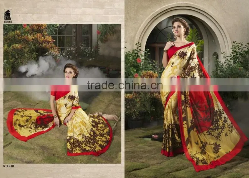 Zari Blouse and Orange color Womaniya Designer Sarees Collections
