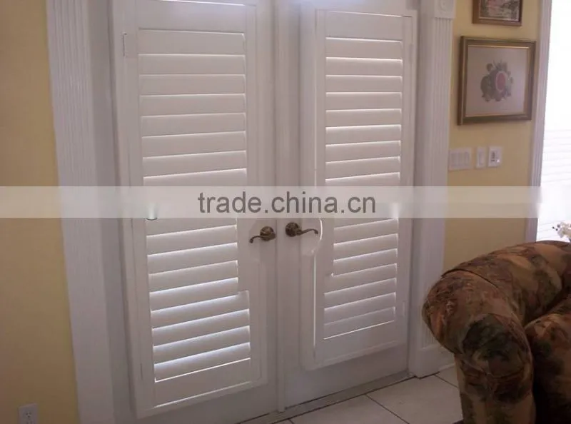 Wooden bifold roller shutter doors