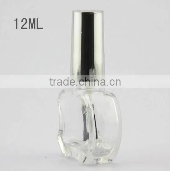 Empty glass nail polish bottle with brush cap, apple shape