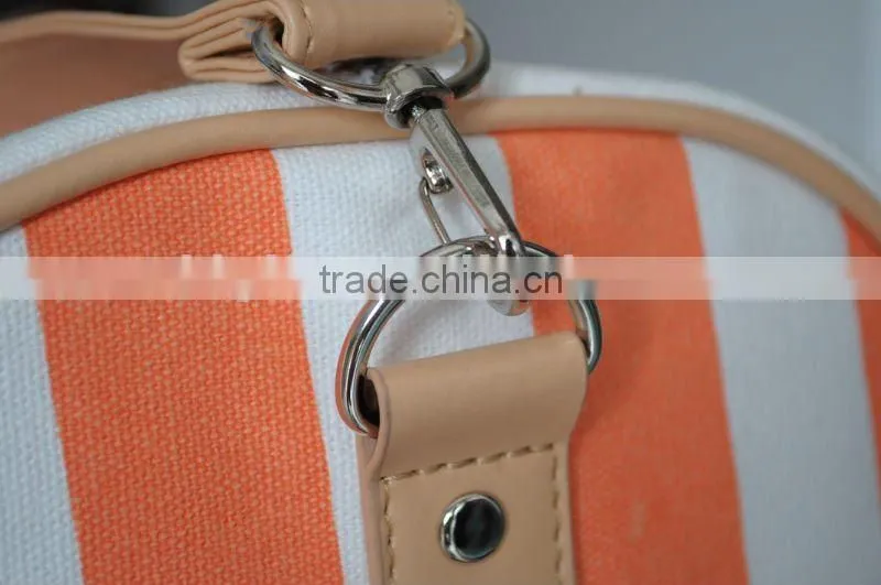 lady canvas travel handbag with leather shoulder belt