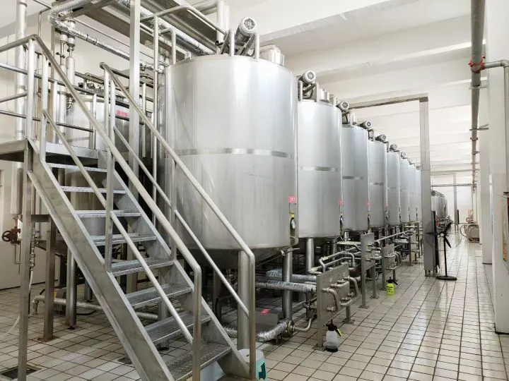 Automatic Dairy Processing Equipment Machine Pasteurized Milk UHT Milk Yogurt Cheese Butter Cream Ghee Production Line Plant