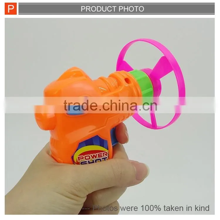 2IN1 Flying disc spinning top gun for kids