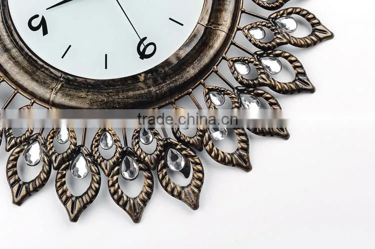 Vintage gold metal wall clock with eye shape