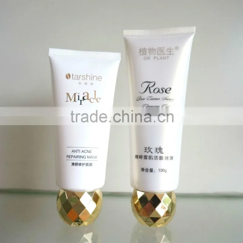 plastic oval tube with plating gold screw on cap for face washing Dia 40mm