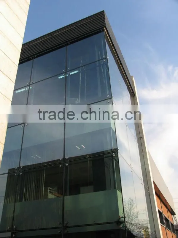 Frameless Glass Wall with spider system for buildings with safety laminated glass