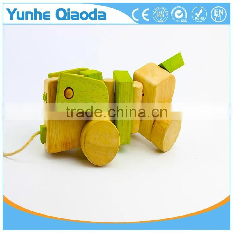Pull Along Dog Wooden Toy wiggles as you pull they make a clicking sound and make a fun baby