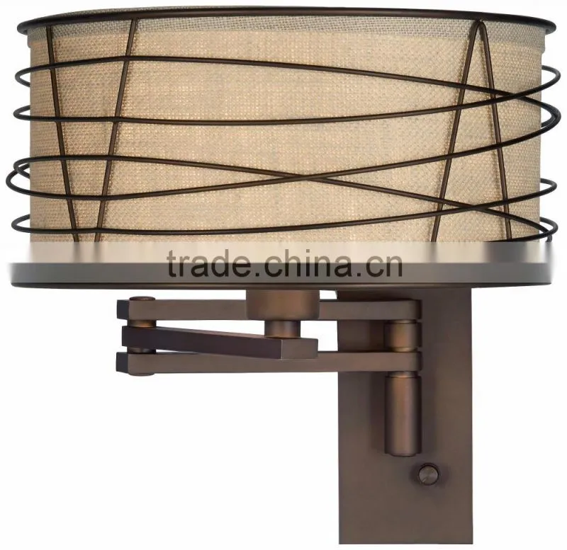 1031-1 wire cage detail surrounds a burlap shade a rich Bronze Metal Swing Arm Wall Lamp
