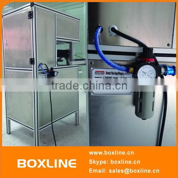 Automatic stretch film soap packaging machine