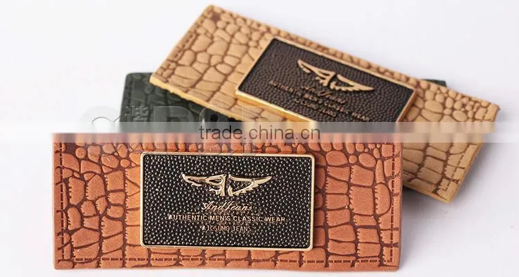 Colorful metal with genuine jeans leather label