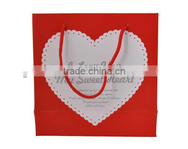Yiwu wholesale heart design handle retail paper bag