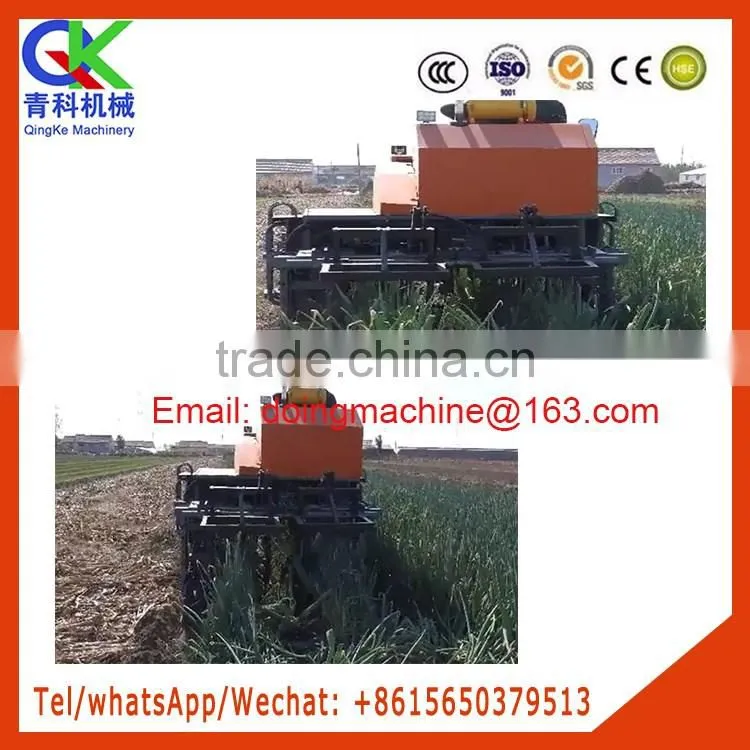 A tractor serves several purposes Green Chinese onion harvester