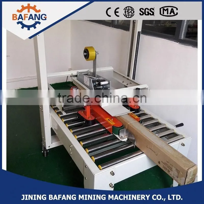 Semi-auto boxes sealing strapping machine