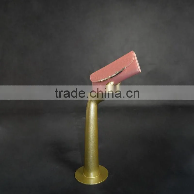 Fashion store display golden glossy merchandising mannequin hand