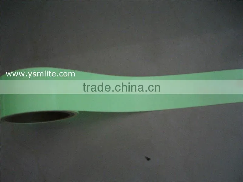 Photoluminescent film, glow sign