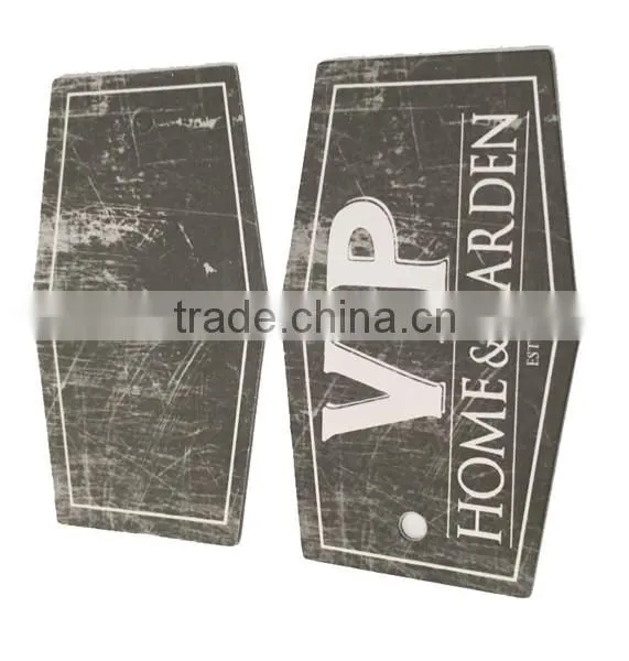 black hang tag with gold stamping