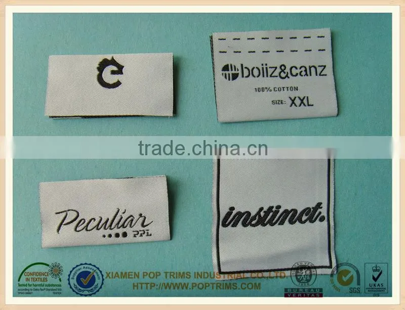 clothing label cut and folded size garment woven label