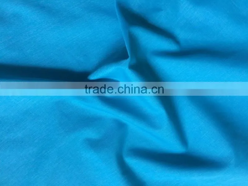 Plain woven 4 way elastic 50D spandex poly cationic fabric bonded with polar fleece softshell for pant sportswear swimwear
