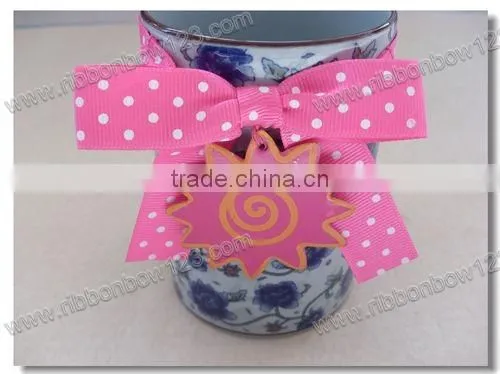 Pink logo ribbon bow with lable for gift