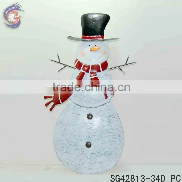 rusty outdoor metal snowman ground stake